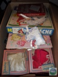 Mixed lot of doll clothes and decorative items