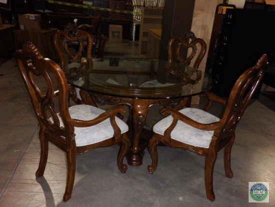 Very nice wooden table with glass top and, 4 chairs