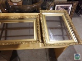 Three framed mirrors