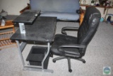 Black Office Chair and Computer Desk