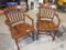 Set of two antique wooden chairs with leather protectors