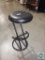Metal stool with cushioned seat