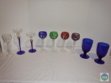 Group of mixed colorful stemware and drinkware