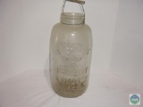 Mason's glass pickle jar with lid and carry handle