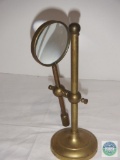 Brass stand with magnifier