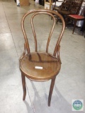 Wooden occasional chair with bent oak accents