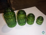 Set of four green glass kitchen canisters