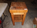 Wooden butcher block topped table