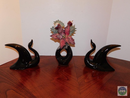 Three pieces of black ceramic decorations