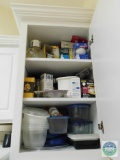 Contents of kitchen cabinets - light bulbs and storage items