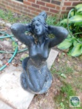 Concrete mermaid statue