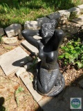 Concrete mermaid statue