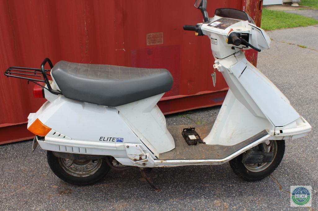 White Honda Elite moped