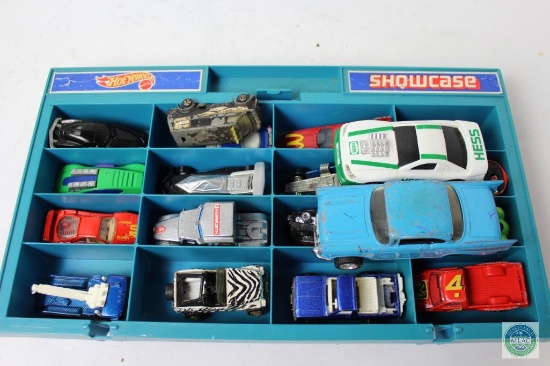 Hot Wheels cars in showcase and HESS car