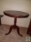 Round wooden occasional table