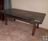 Wooden table with faux marble top