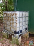 Water reclamation tank with caged exterior