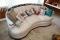 Curve Style Sofa with Carved Mahogany Trim.