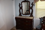 3 Drawer Dresser w/Marble Top and Ornate Mirror Frame.