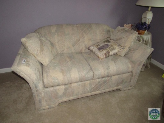 Cloth upholstered loveseat