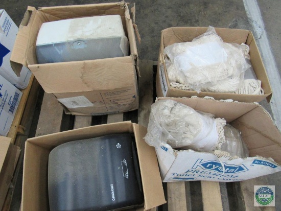 Pallet of mop heads and paper towel dispensers