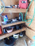 Shelf Contents; Battery Charger, Oil Drain Container, Utility Pump, Grease Guns +