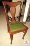 Antique Claw Foot Chair with Green Vinyl Seat