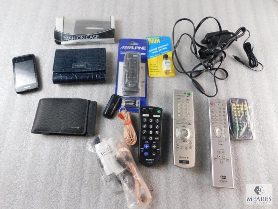 Lot of Electronic Items Remotes, Cell Phone, Cases, and Power Cords