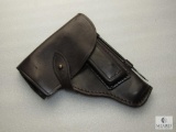 Leather military holster with cleaning rod and magazine