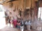 Wall contents of Barn; Horse Tack Ropes, Halters, Stirrups, Bridles, Buckets, Mule Yoke, Tools +