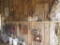 Wall contents of Barn; Antique Tools, Mule Yokes, Cast Iron Pans, License Plates, Rope +