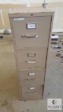 Tan 4 drawer file cabinet