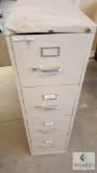 Tan 4 drawer file cabinet