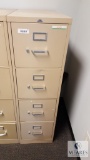 Tan 4 Drawer file cabinet