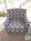 Navy and white patterned occasional chair with exposed silver nailheads