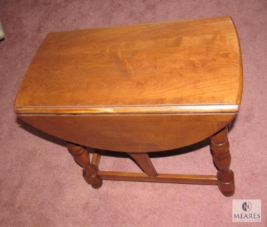 Vintage wooden side table with fold down sides