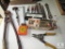 Lot of tools bolt cutters quarter-inch drill head files nut drivers tape measure impact driver