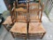 Lot 5 Vintage wood chairs with rattan bottom