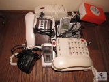 Lot of electronic alarm clocks phones cordless phone