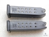 2 Factory Glock .40 S&W magazines each hold 13 rounds of ammo