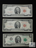 (2) Series 1963 $2 red seal notes and (1) Series 1976 $2 note