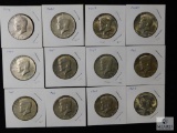 Mixed lot of (12) 40% silver Kennedy half dollars