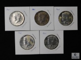 Group of (5) silver Kennedy half dollars