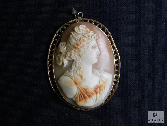 Large shell cameo in ornate frame 10" marked on clasp pin detached and top left broken out