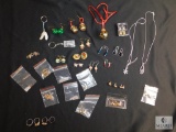 Assorted costume jewelry includes matched earrings, christmas items, etc.