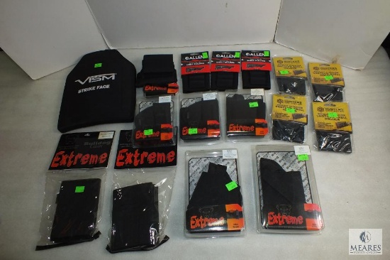 Lot of Bulldog Cases Includes Ankle holster , Belly wrap Holsters, Vism Ballistic Panel.