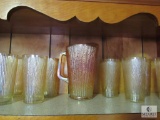 Orange Carnival Glass Pitcher and 9 matching Tumbler Cups