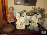 Contents of dresser Floral decor, Pottery, and little girl boy figurines