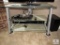 Glass Shelf Entertainment Center with Sony Blu-ray player and Sound Bar