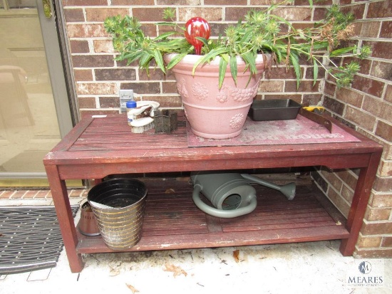 Wood outdoor planting table with Contents Flower pot, and watering jug